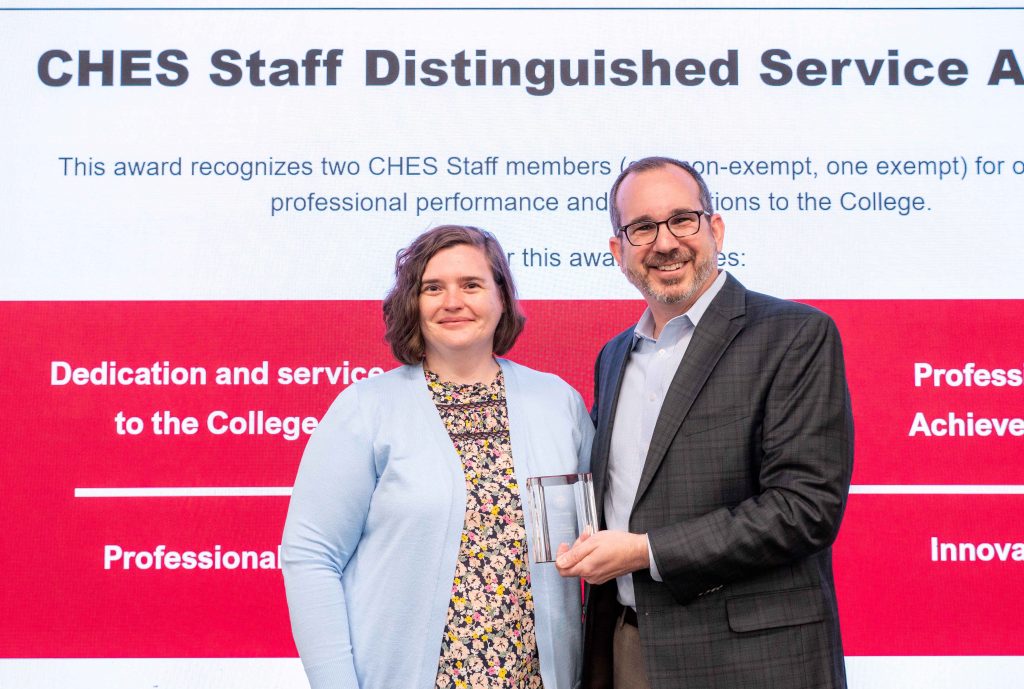Sarah Roberts receives her award from the dean