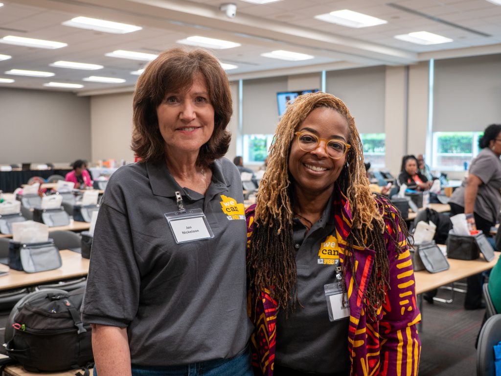 Two women smiling