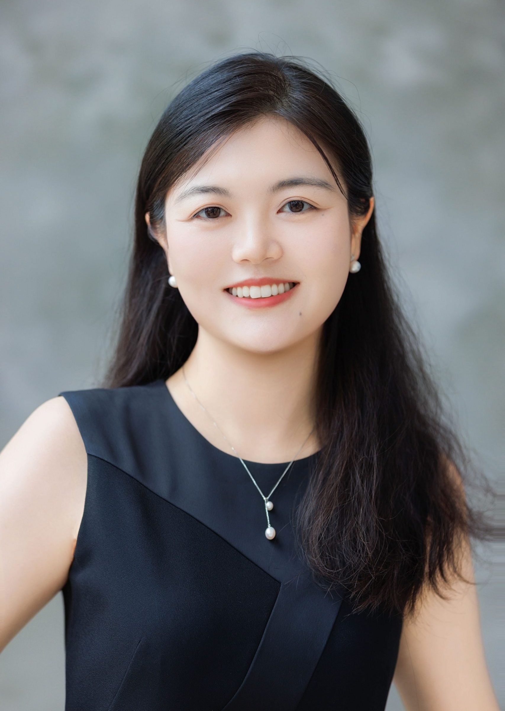 Yiling_Zhang Professor for Department Consumer Sciences wearing a black top.